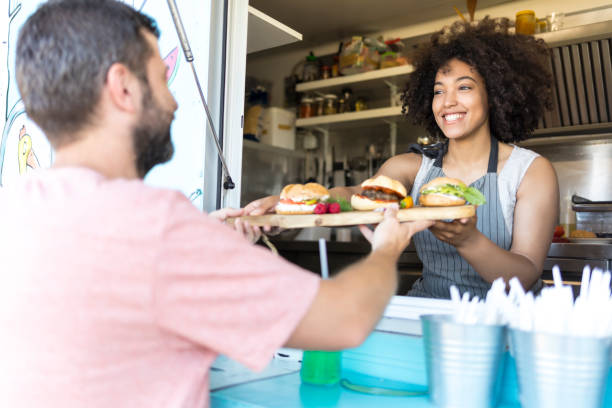 istock Food van worker giving order to customer 844401508