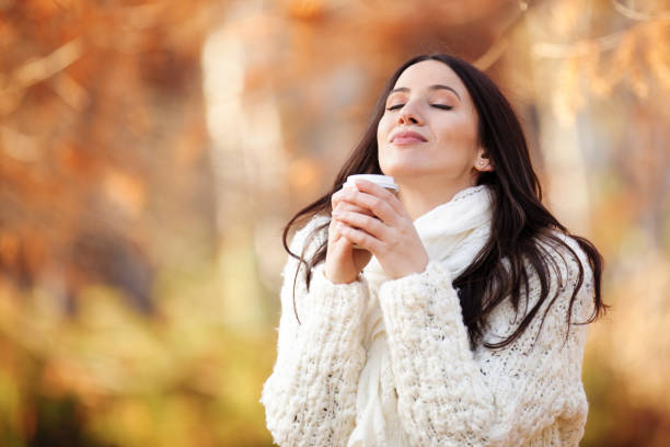 istock Beautiful Woman Enjoying Autumn 844402988