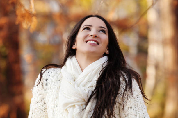 istock Beautiful Woman Enjoying Autumn 844403012