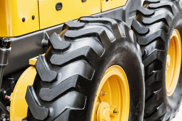istock wheel of the tractor or other construction equipment large 844406190