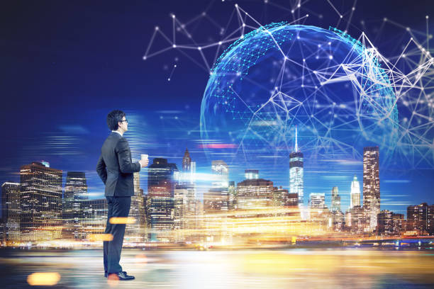 istock Man with coffee looking at planet in night city 844406382