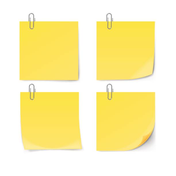 żółta notatka samoprzylepna z spinaczem do papieru izolowanym na białym tle. - thumbtack paper clip isolated equipment stock illustrations