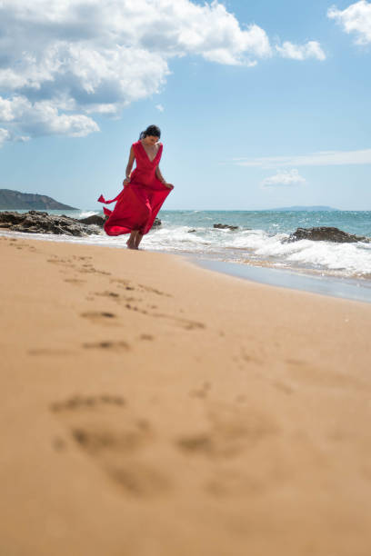 istock Woman in red 844413914