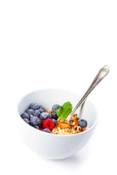 istock Granola with fresh organic raspberries and blueberries. Healthy breakfast 844414238