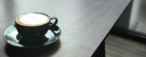 istock coffee latte on wooden table. 844417450