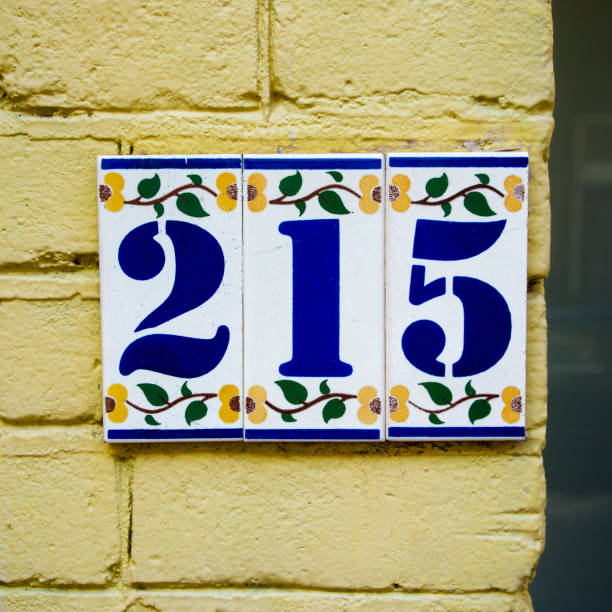 Number 215 ceramic house number two hundred and fifteen, on three ceramic tiles ceramic tile house numbers stock pictures, royalty-free photos & images