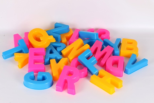 a bunch of colorful letters in the studio