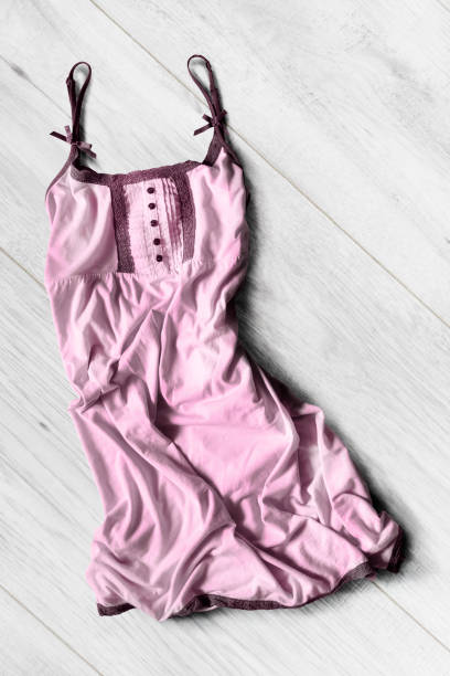 istock Dress on wooden floor 844432040