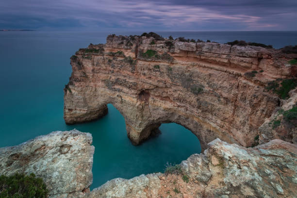 Heart shape in the maritime landscape. The coast of Portugal. Heart shape in the maritime landscape. The coast of Portugal. praia da marinha stock pictures, royalty-free photos & images