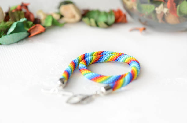 istock Rainbow beaded necklace on a textile background close up 844444414
