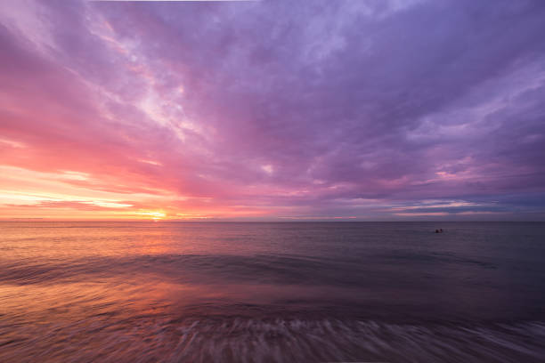 istock bright, fire sunset on the sea beach 844447052
