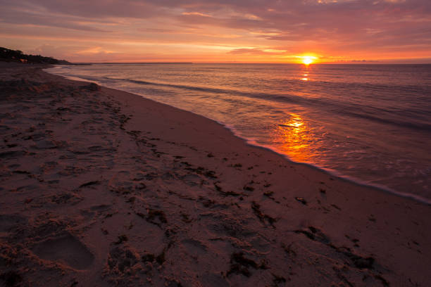 istock bright, fire sunset on the sea beach 844447150