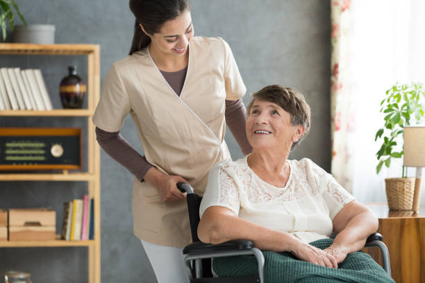 istock Caregiver in retirement home 844452020