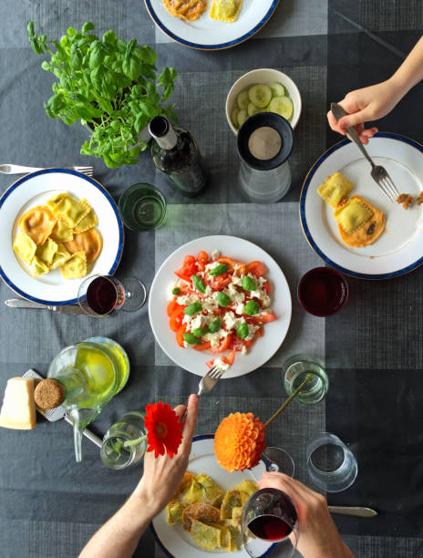 istock Family eating pasta top view 844458758