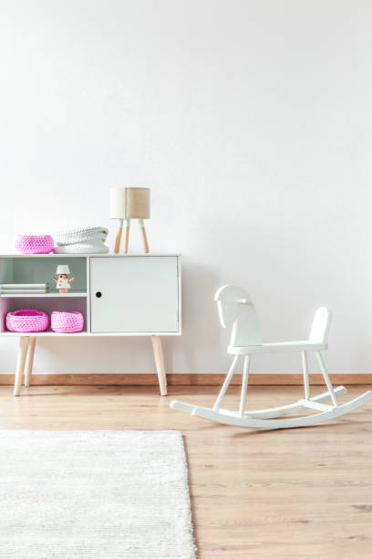 istock Rocking horse in kids room 844458832