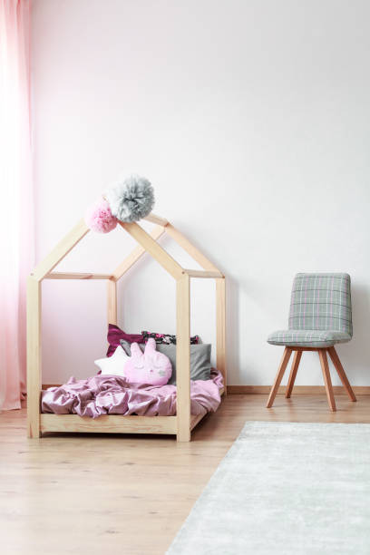 istock Kids bedroom with grey chair 844458868