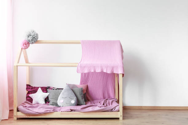 istock Pink blanket on girls bed 844458874