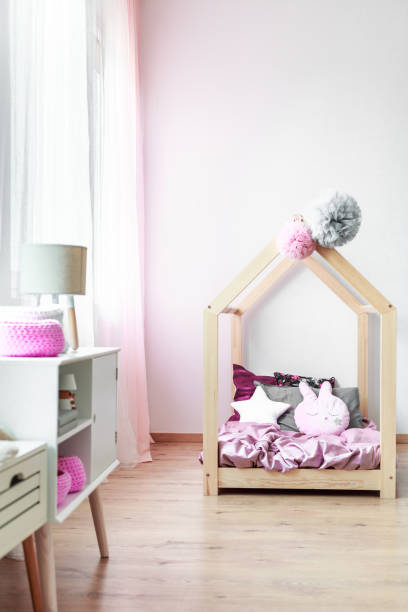 istock Pink bedroom with handmade bed 844458888