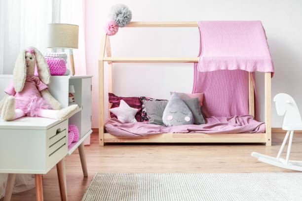 istock Pink bedroom with DIY bed 844458944