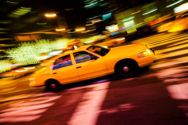 istock Yellow cab with panning motion in New York City 844459354