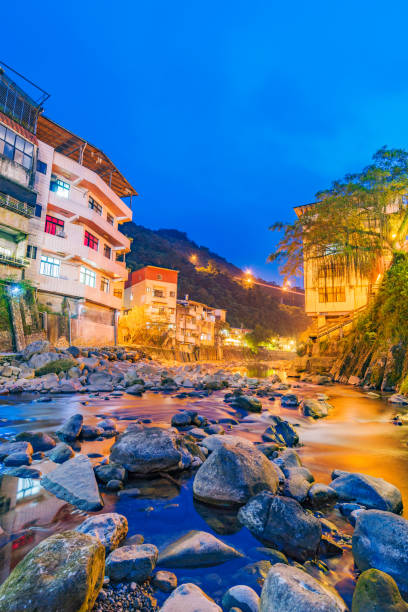 istock Night view of Shiding buildings and river 844462412