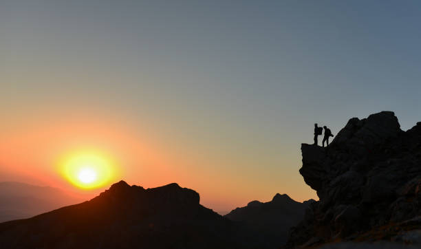 istock watch the sunrise from the summit rocks 844463588