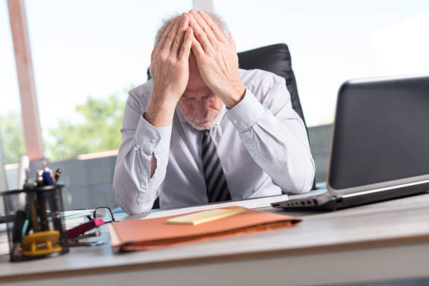 istock Portrait of overworked businessman 844470552