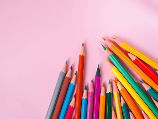 istock Colored pencil on pink paper background for drawing color circle 844477540