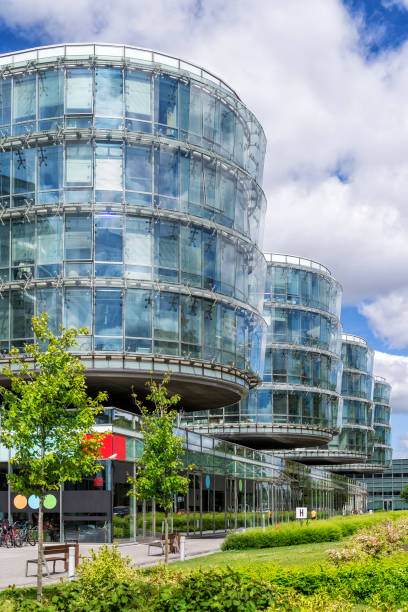 istock Green square with benches in front of office buildings compex 844484990