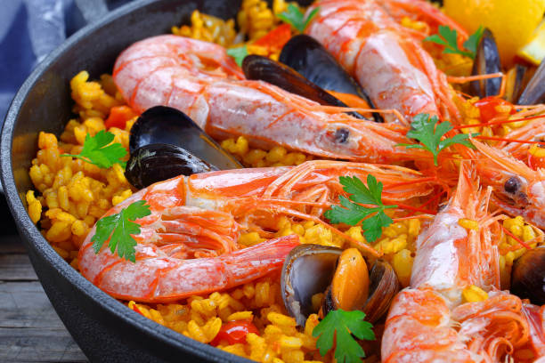 istock seafood paella with king prawns, mussels 844485938