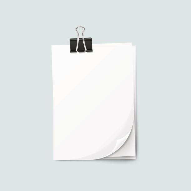 istock Realistic several sheets of paper and a metal paper clip isolated on background. 844508616