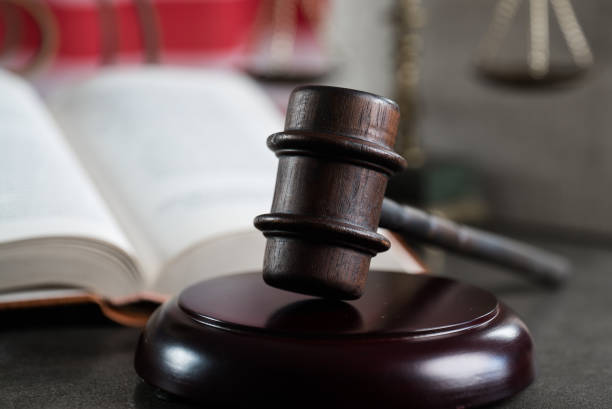 istock Law and justice symbols on USA flag background. 844518310