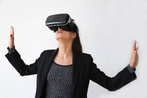 istock Beautiful Woman wearing VR Virtual Reality Headset with Interface 844521684