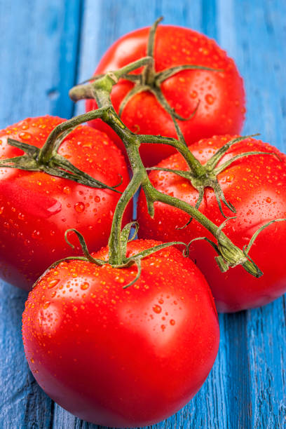 istock Macro of red ripe tomatoes. 844521972