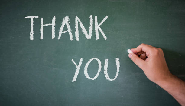 istock Thank you written on a blackboard in white chalk. 844525008