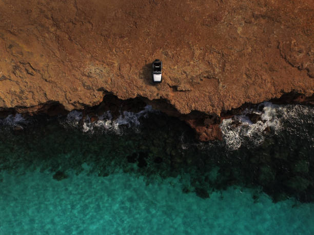 istock Jeep at the end of a cliff 844525894