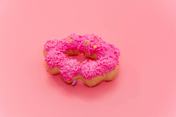 istock colorful doughnut on pink background 844530324