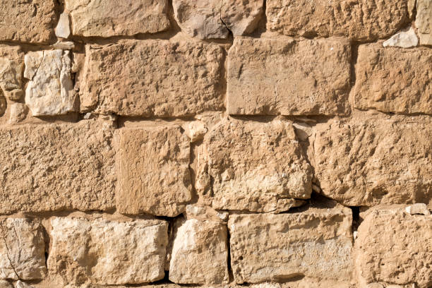 istock The surface of an ancient wall made of large stone blocks 844536066