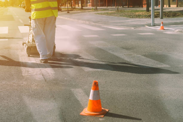 istock Worker is painting zebra pedestrian crosswalk lines 844546526