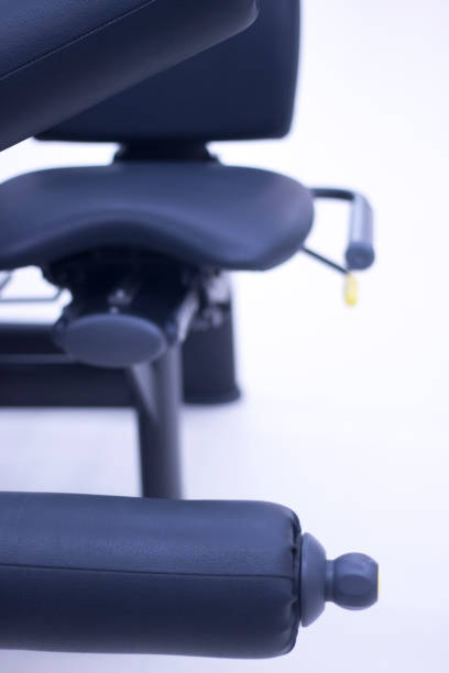 istock Leg weights extension for quadriceps and curl for hamstrings gym machine resistance workout equiment. 844546964