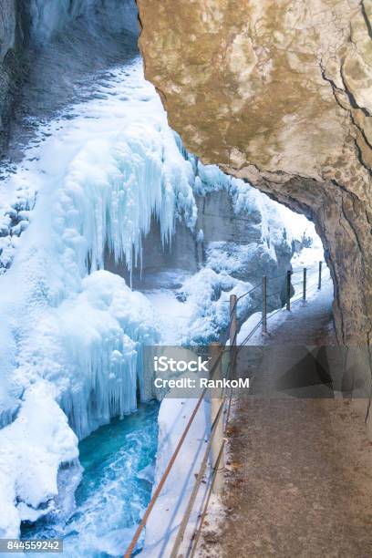 Partnachklamm With Stream Snowcovered Rocks And Icicles In Winter Garmischpartenkirchen Bavaria Germany Stock Photo - Download Image Now