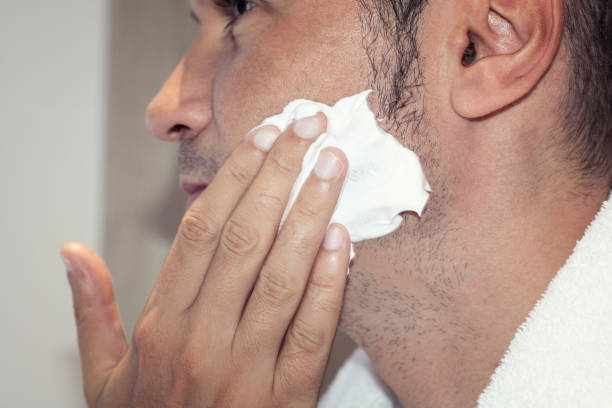 istock Applying shaving cream of face. 844569922