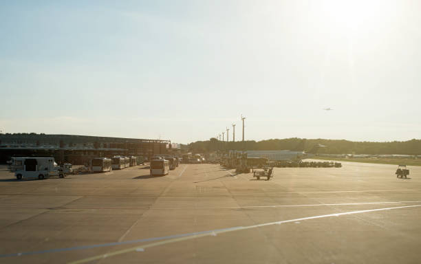 istock Airport in the morning. Buses and airplanes. 844585530