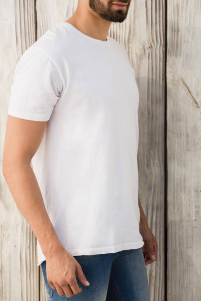 istock Man posing against wooden wall 844608726