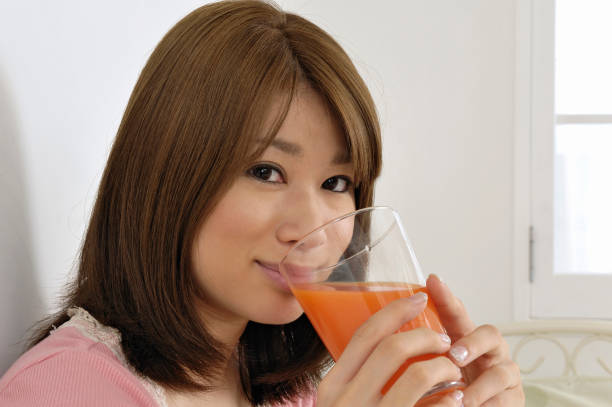 istock Woman drinking vegetable juice 844611302