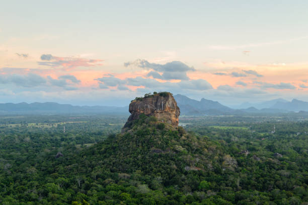 The historical Sigiriya rock fortress is surrounded by a breathtaking landscape A stunning landscape surrounding the famous rock Sigiriya sri lankan culture photos stock pictures, royalty-free photos & images
