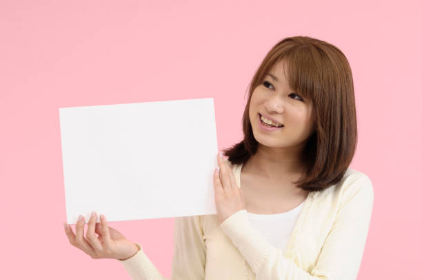 istock Woman with a white board 844615572