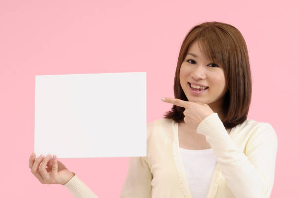 istock Woman with a white board 844615600