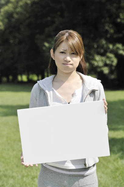 istock Woman with a white board 844616824
