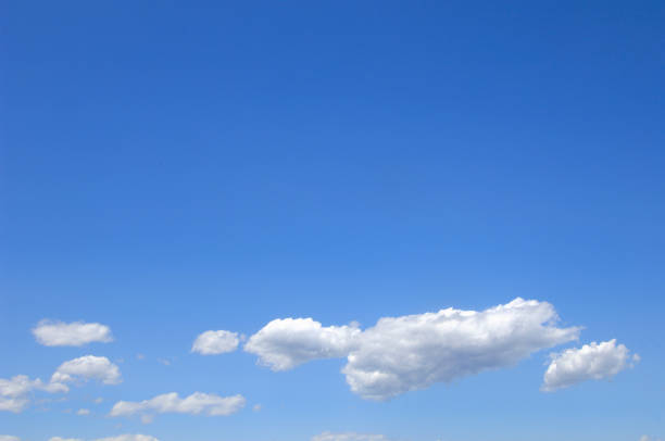 istock Blue skies and cottony clouds 844619326